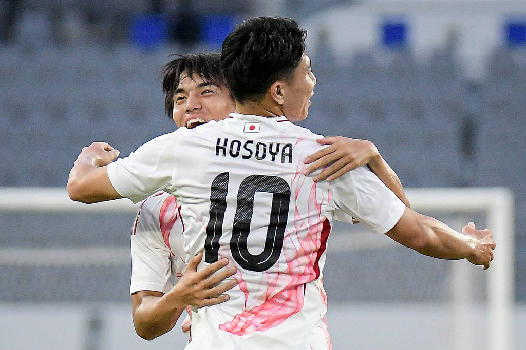 韩国足球联赛
_东亚杯-张玉宁失单刀 国足0-2不敌日本遭两连败